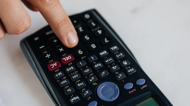 someone using a calculator