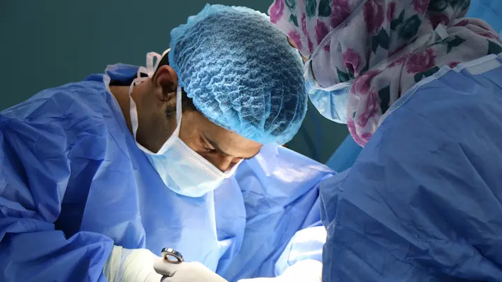two surgeons doing an operation